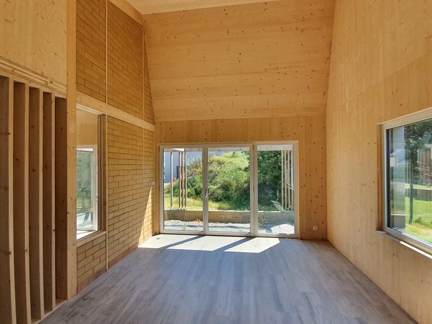 Maison passive en bois et menuiseries triple vitrage